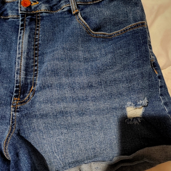 Blue denim distressed jean shorts. Size 34. - Picture 2 of 8